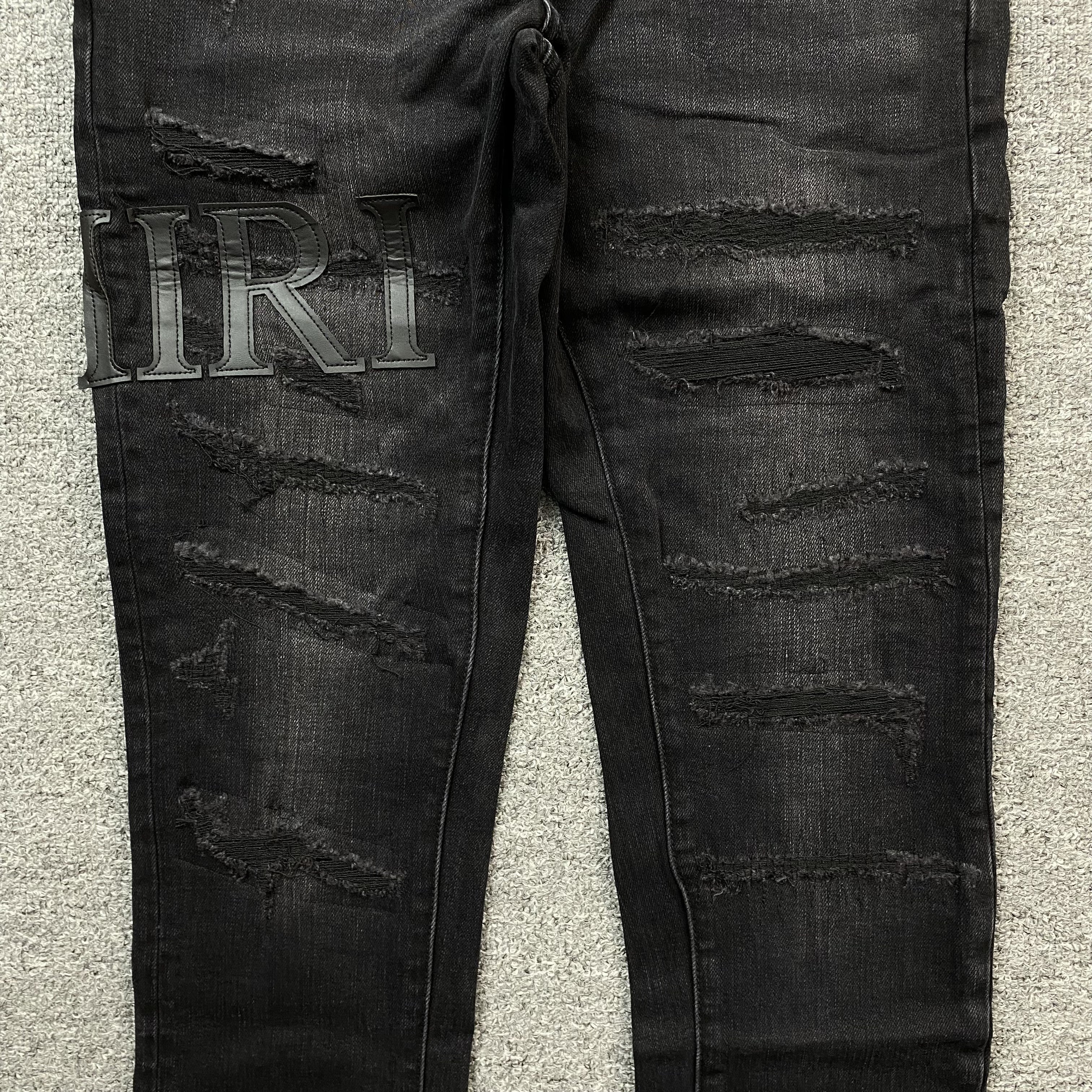AMIRI CORE APPLIQUE BLACK LEATHER JEANS - netstar®