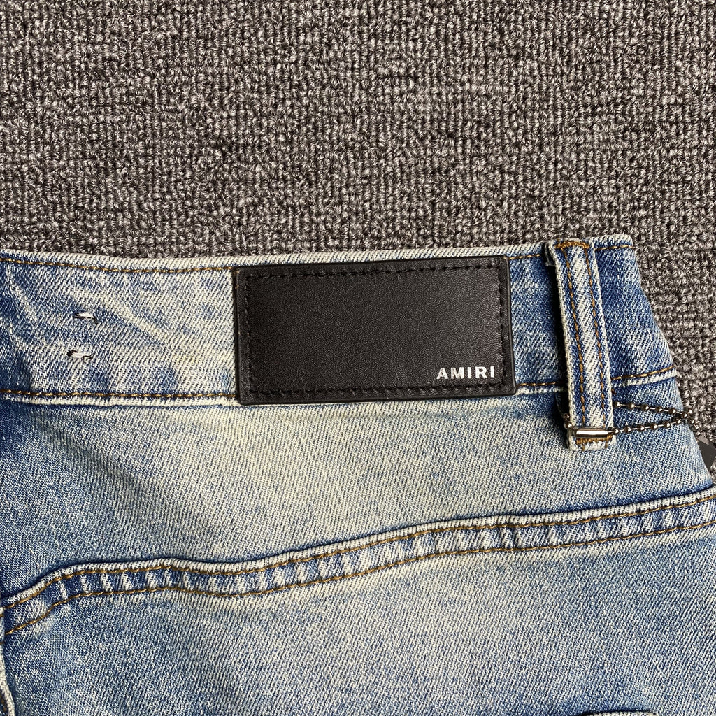 AMIRI VARSITY LOGO JEANS - netstar®