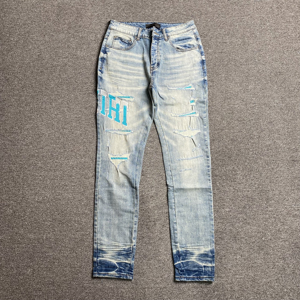 AMIRI VARSITY LOGO JEANS - netstar®