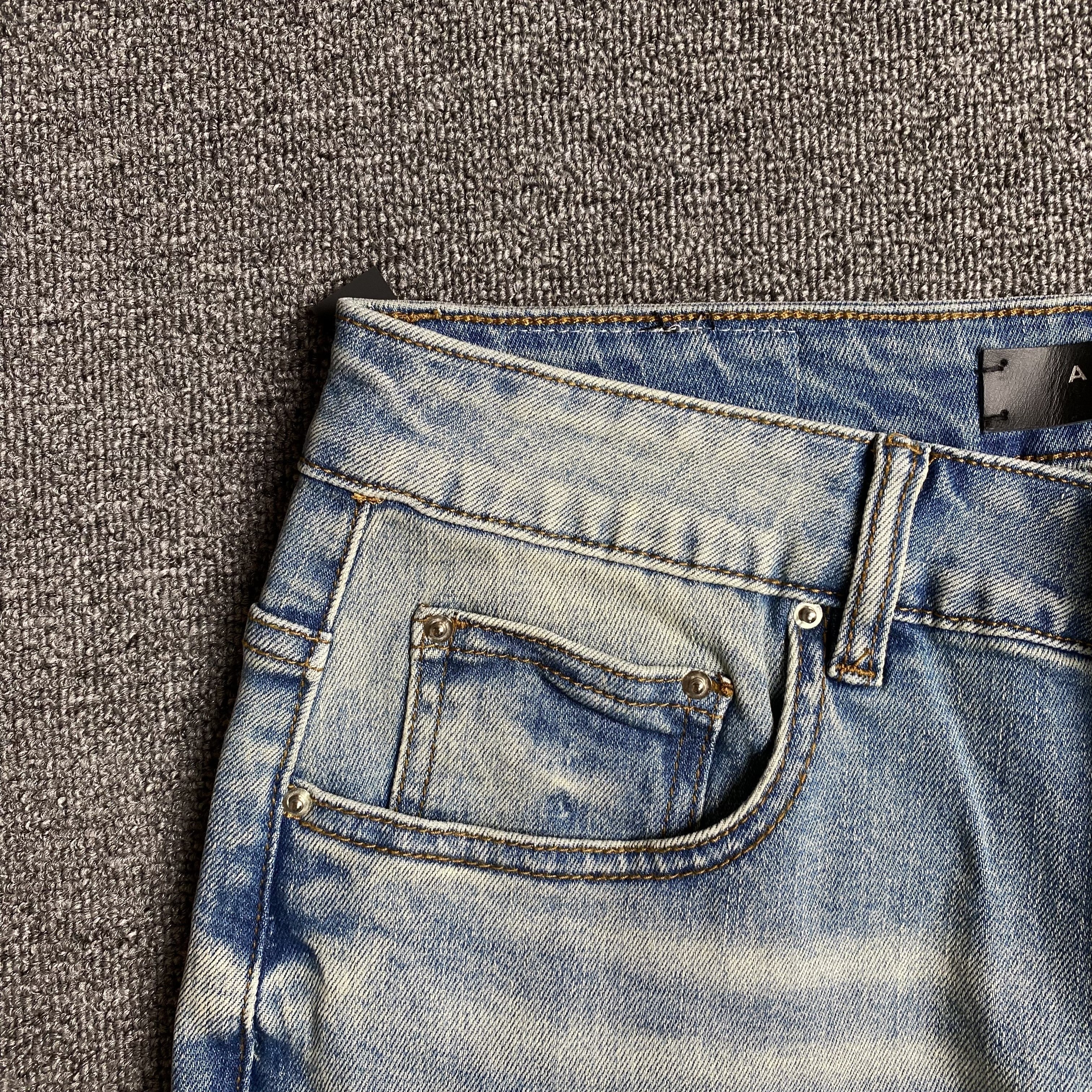AMIRI VARSITY LOGO JEANS - netstar®