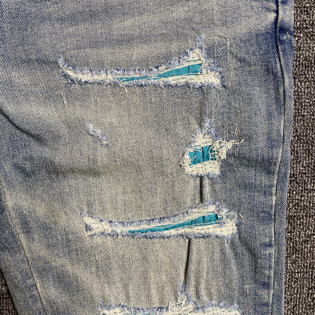 AMIRI VARSITY LOGO JEANS - netstar®