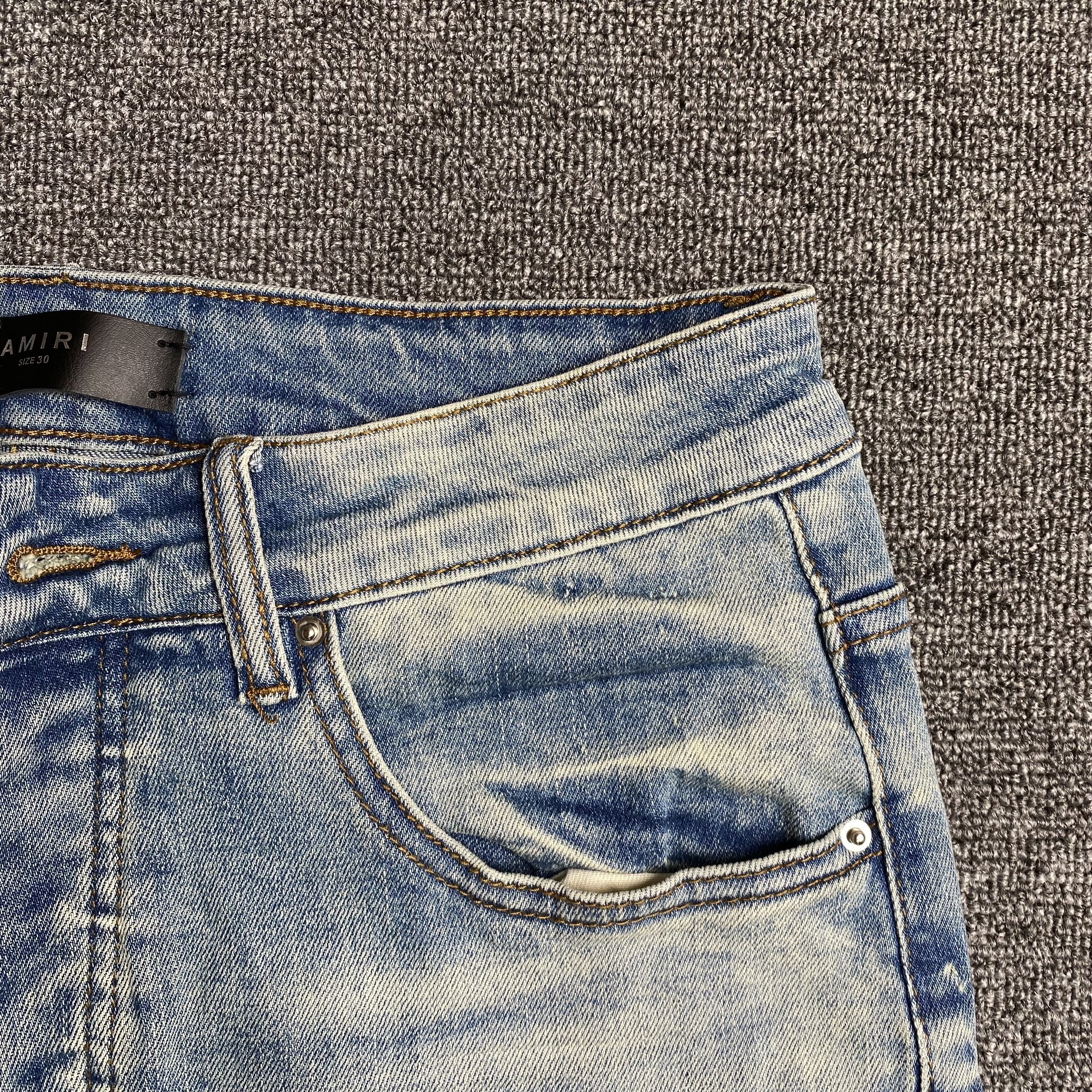 AMIRI VARSITY LOGO JEANS - netstar®