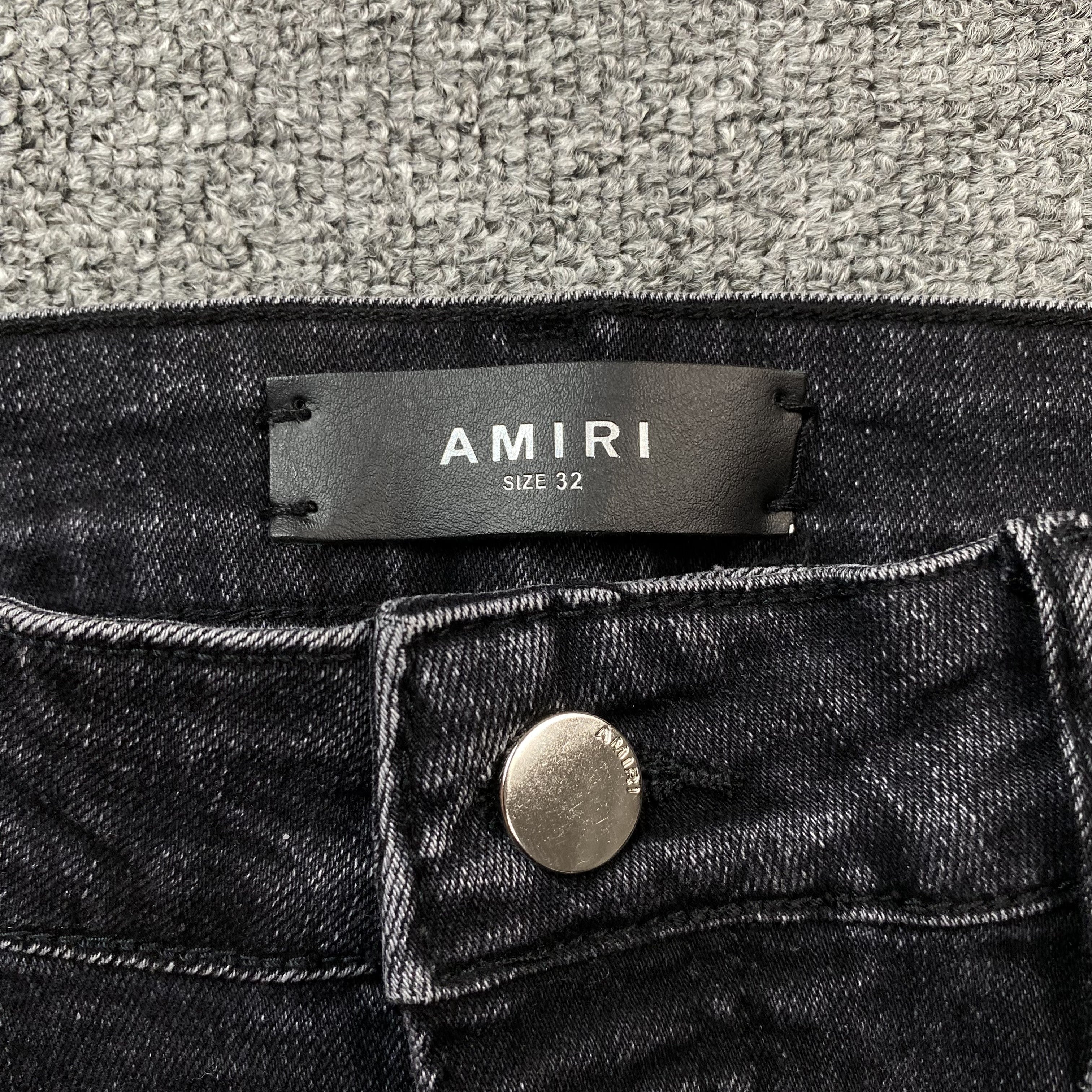 AMIRI VARSITY LOGO REPAIR JEANS - netstar®