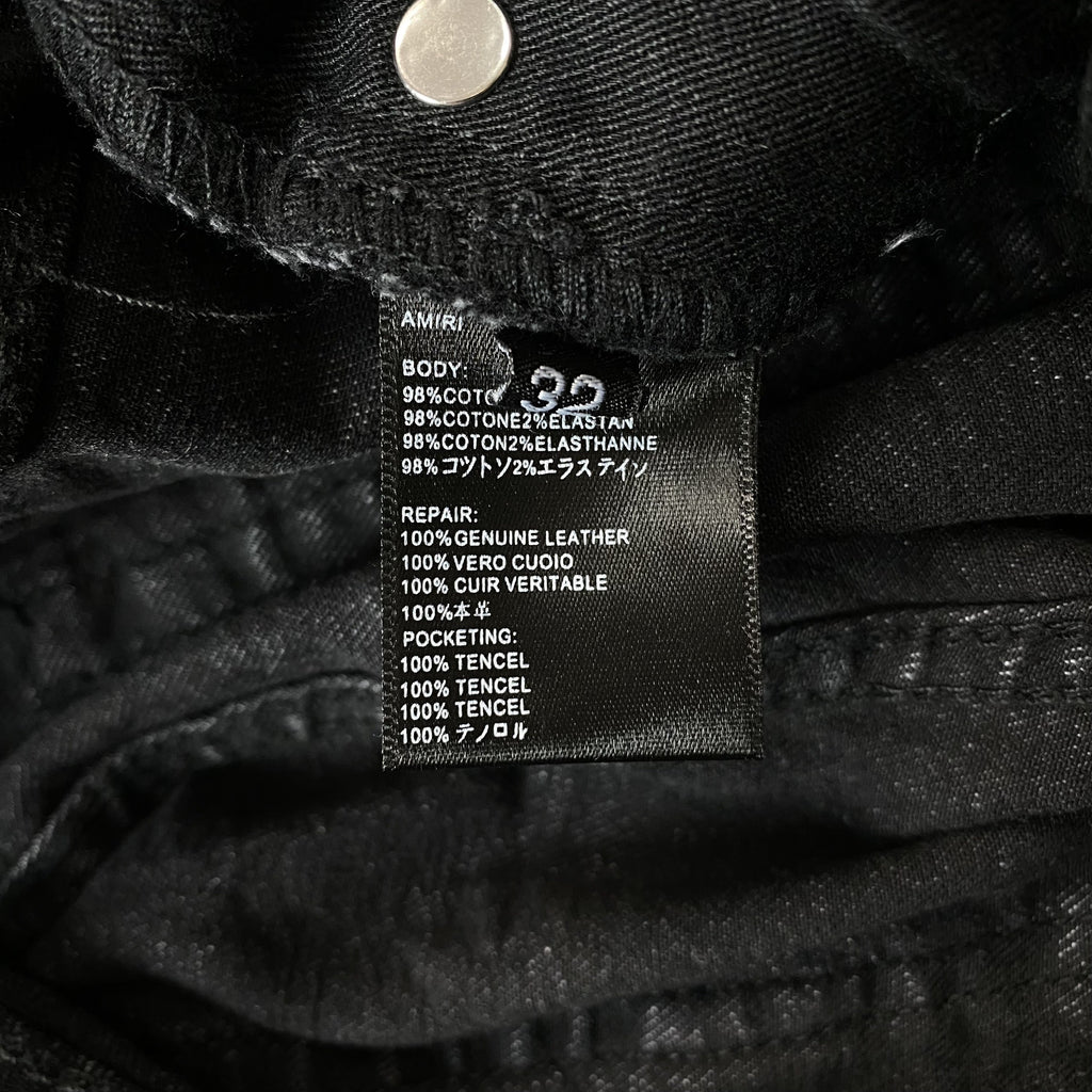 AMIRI VARSITY LOGO REPAIR JEANS - netstar®