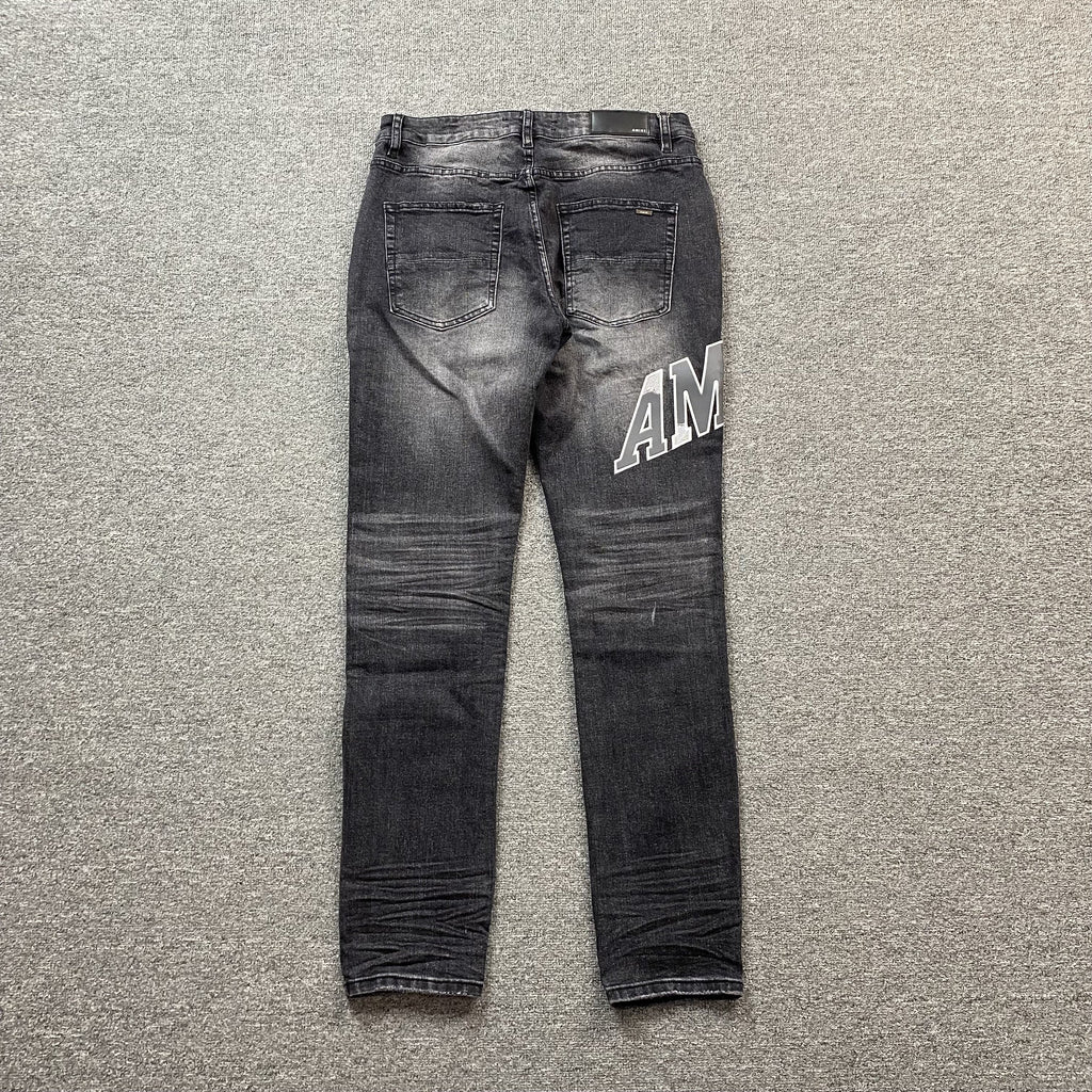 AMIRI VARSITY LOGO REPAIR JEANS - netstar®