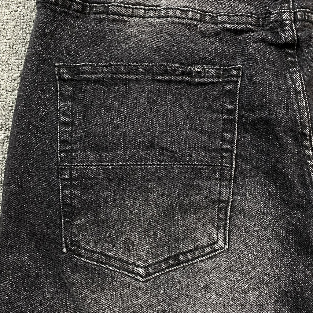 AMIRI VARSITY LOGO REPAIR JEANS - netstar®