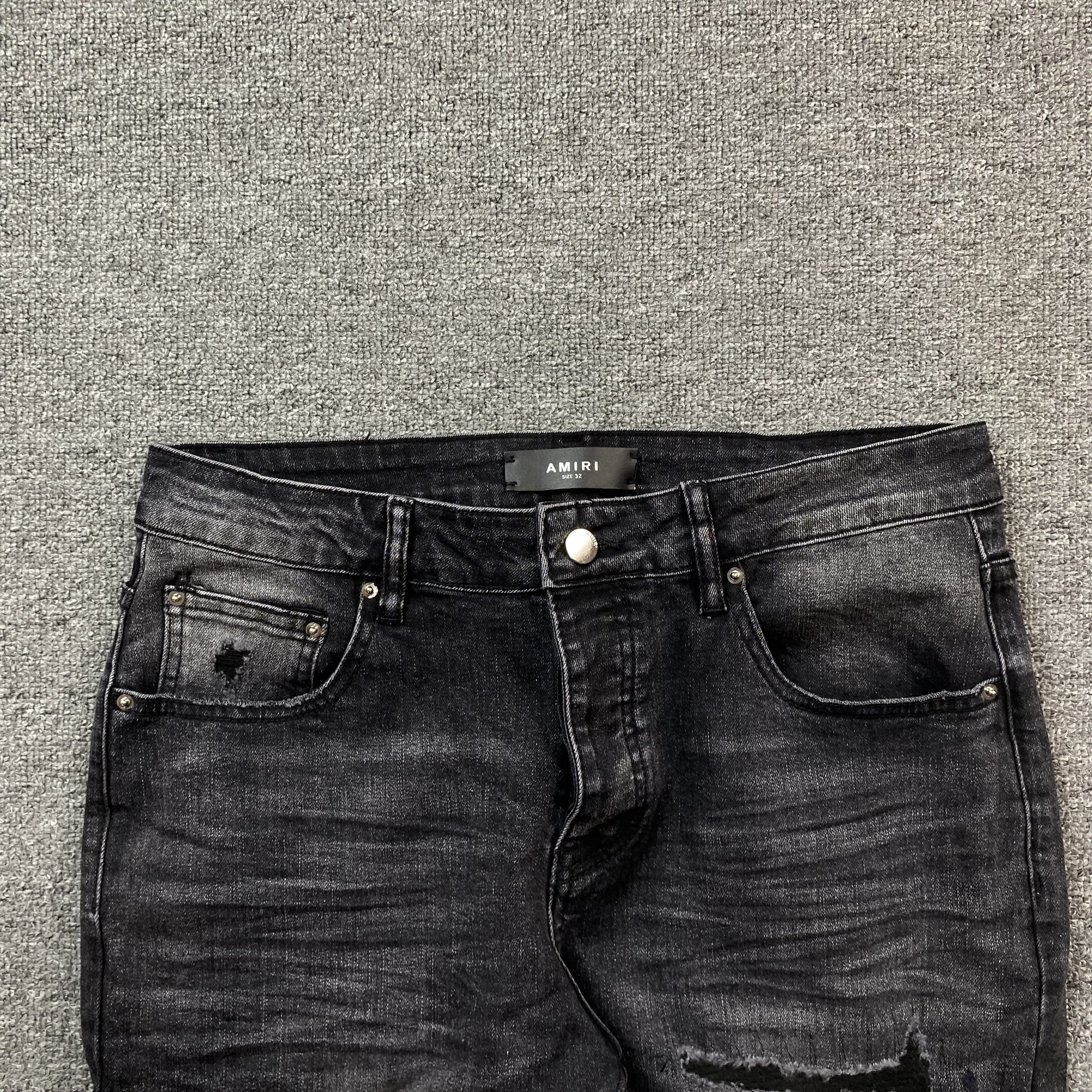AMIRI VARSITY LOGO REPAIR JEANS - netstar®