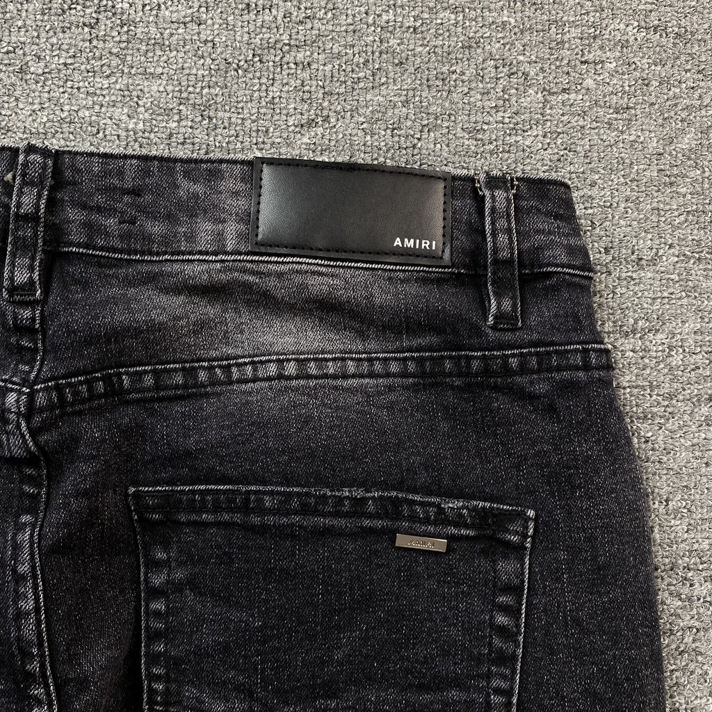 AMIRI VARSITY LOGO REPAIR JEANS - netstar®
