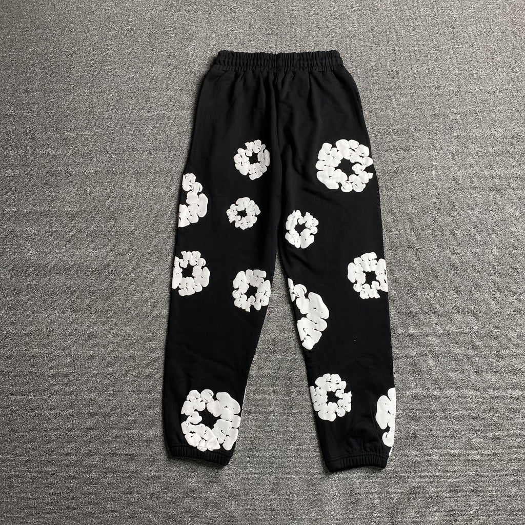 DENIM TEARS COTTON WREATH SWEATPANTS BLACK - netstar®
