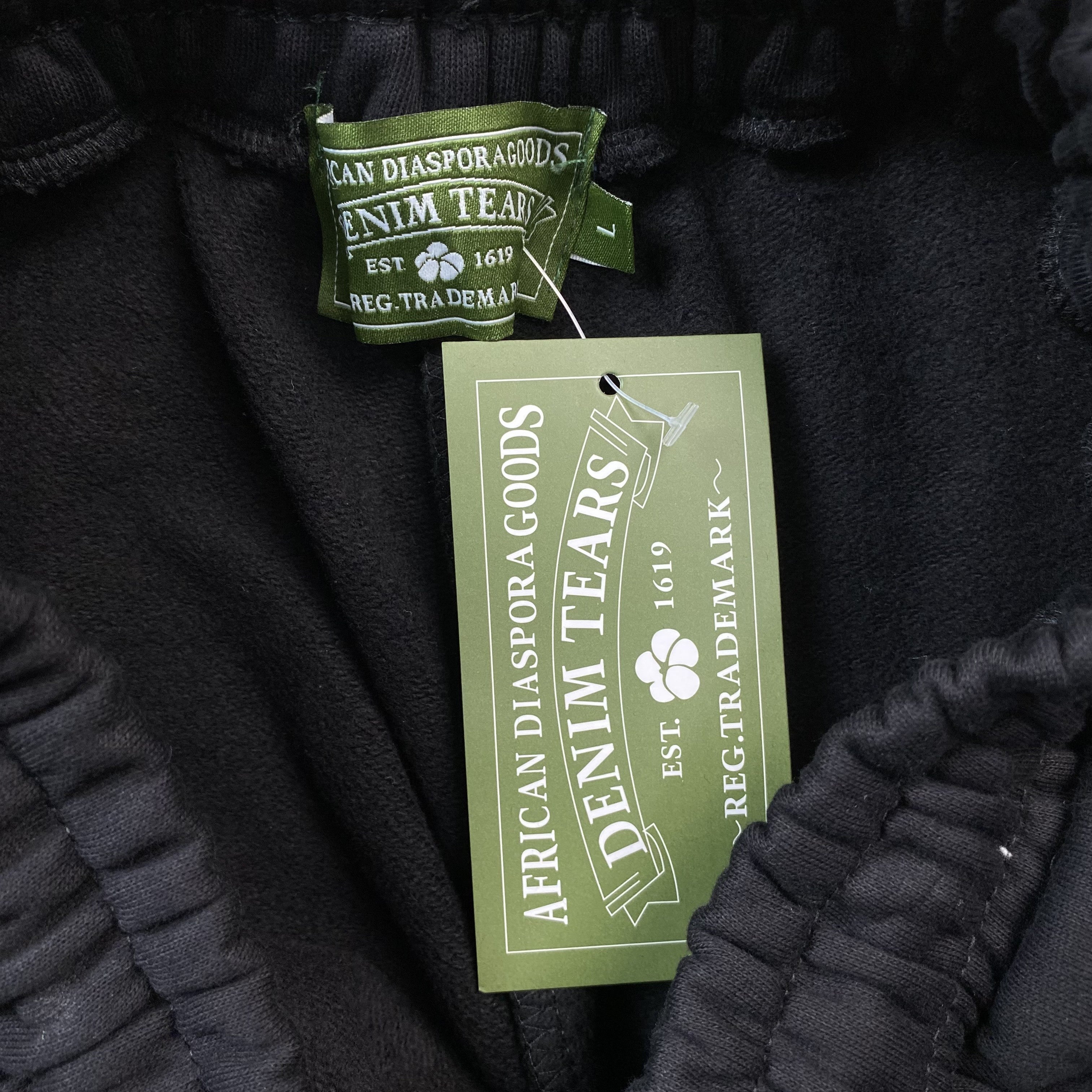 DENIM TEARS COTTON WREATH SWEATPANTS MONOCHROME BLACK - netstar®