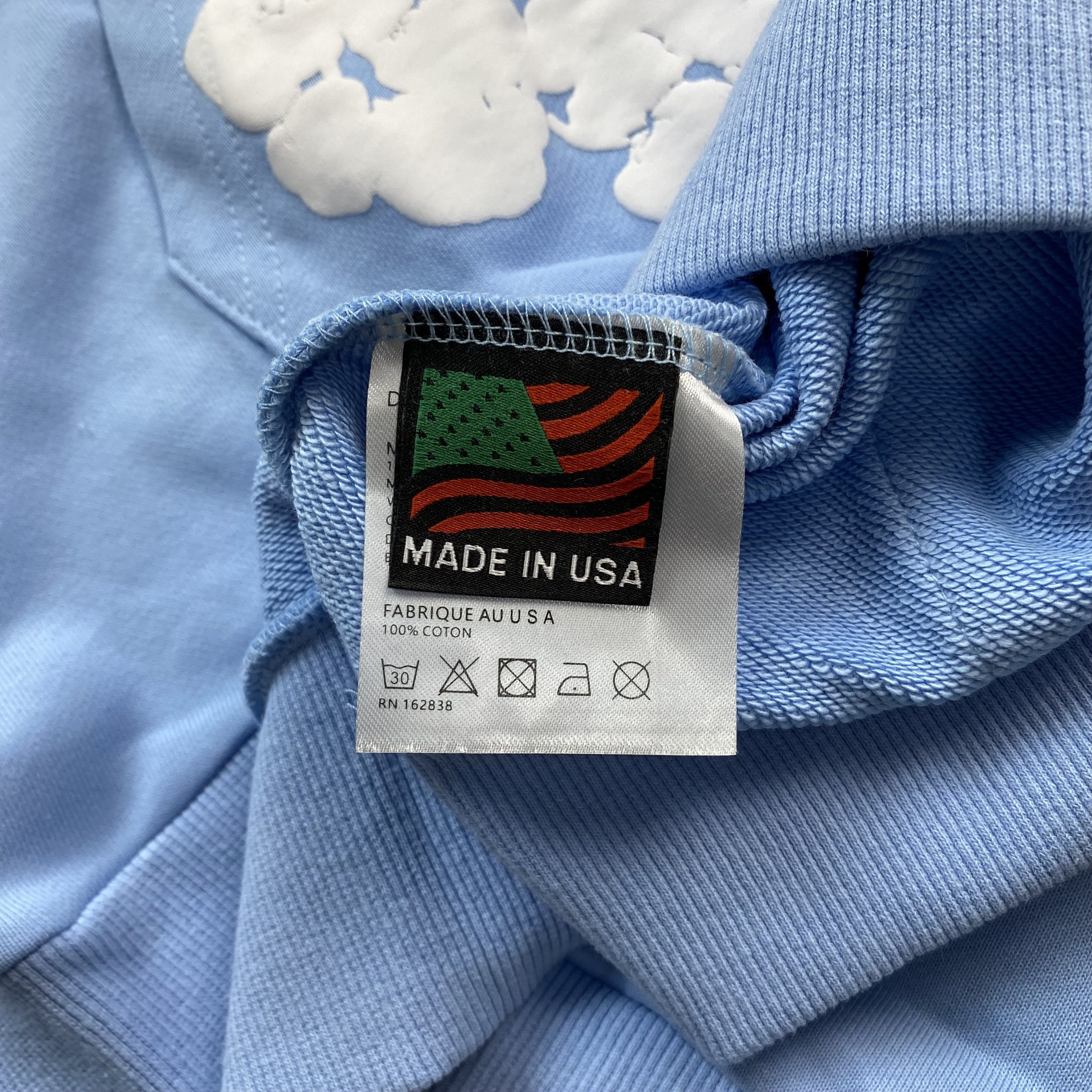 DENIM TEARS COTTON WREATH HOODIE BABY BLUE - netstar®