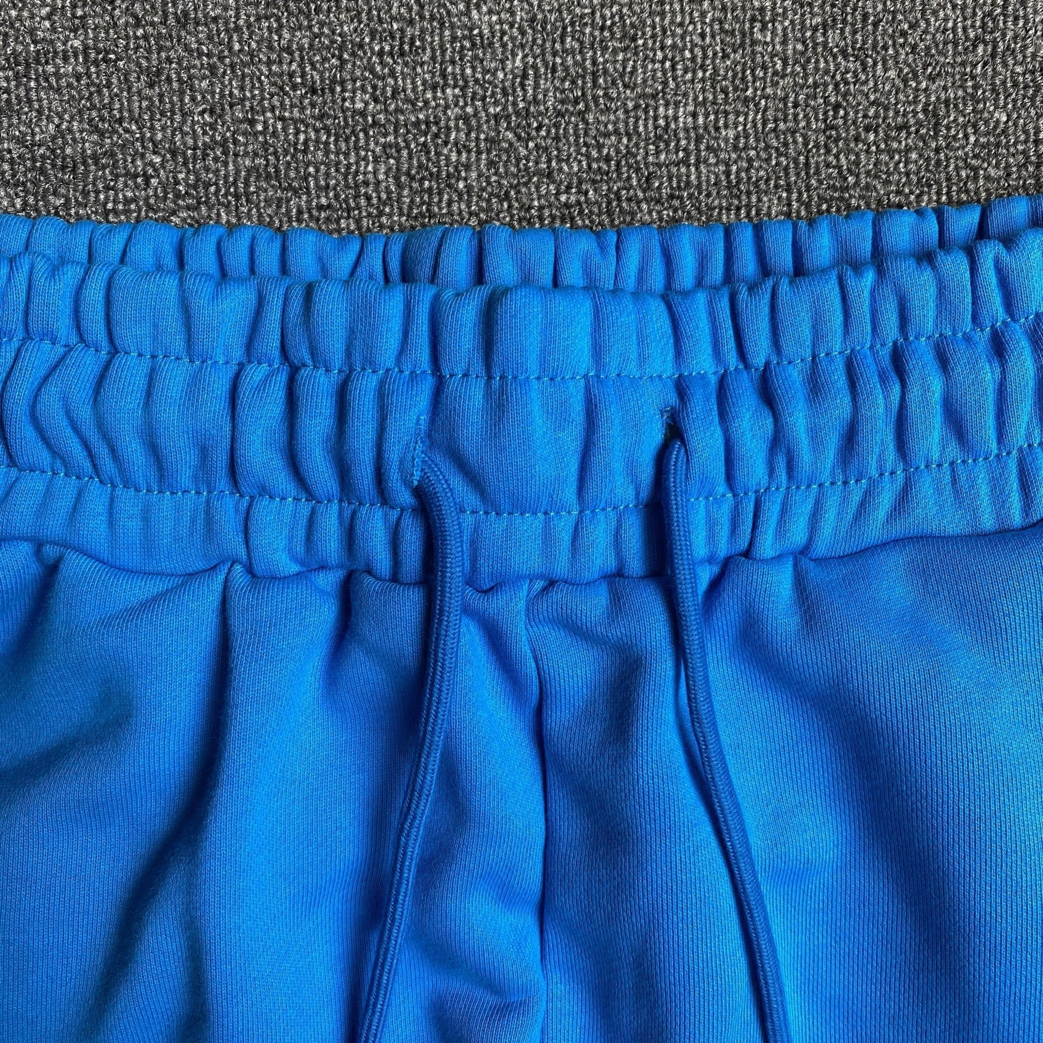 DENIM TEARS COTTON WREATH SWEATPANTS AZURE BLUE - netstar