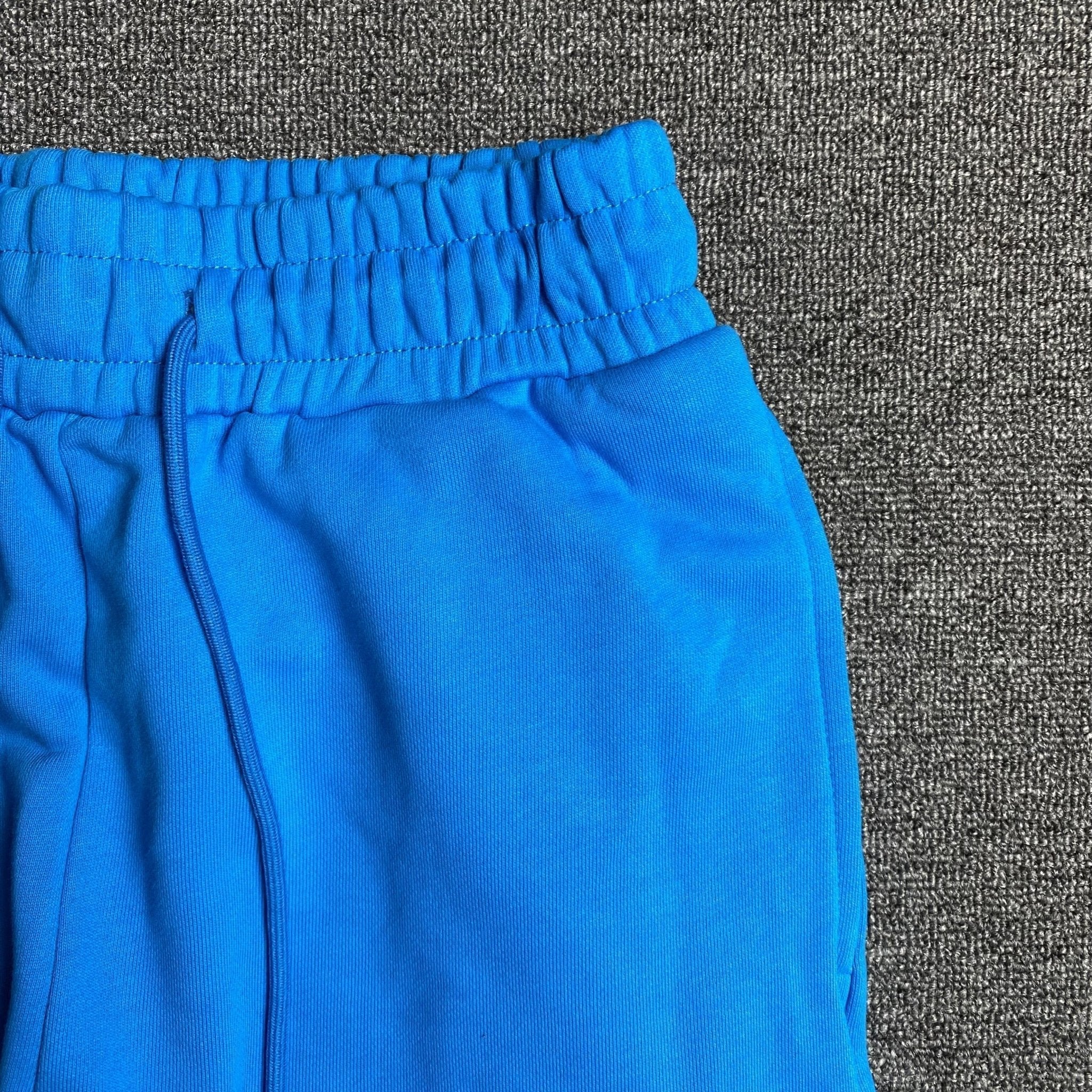 DENIM TEARS COTTON WREATH SWEATPANTS AZURE BLUE - netstar
