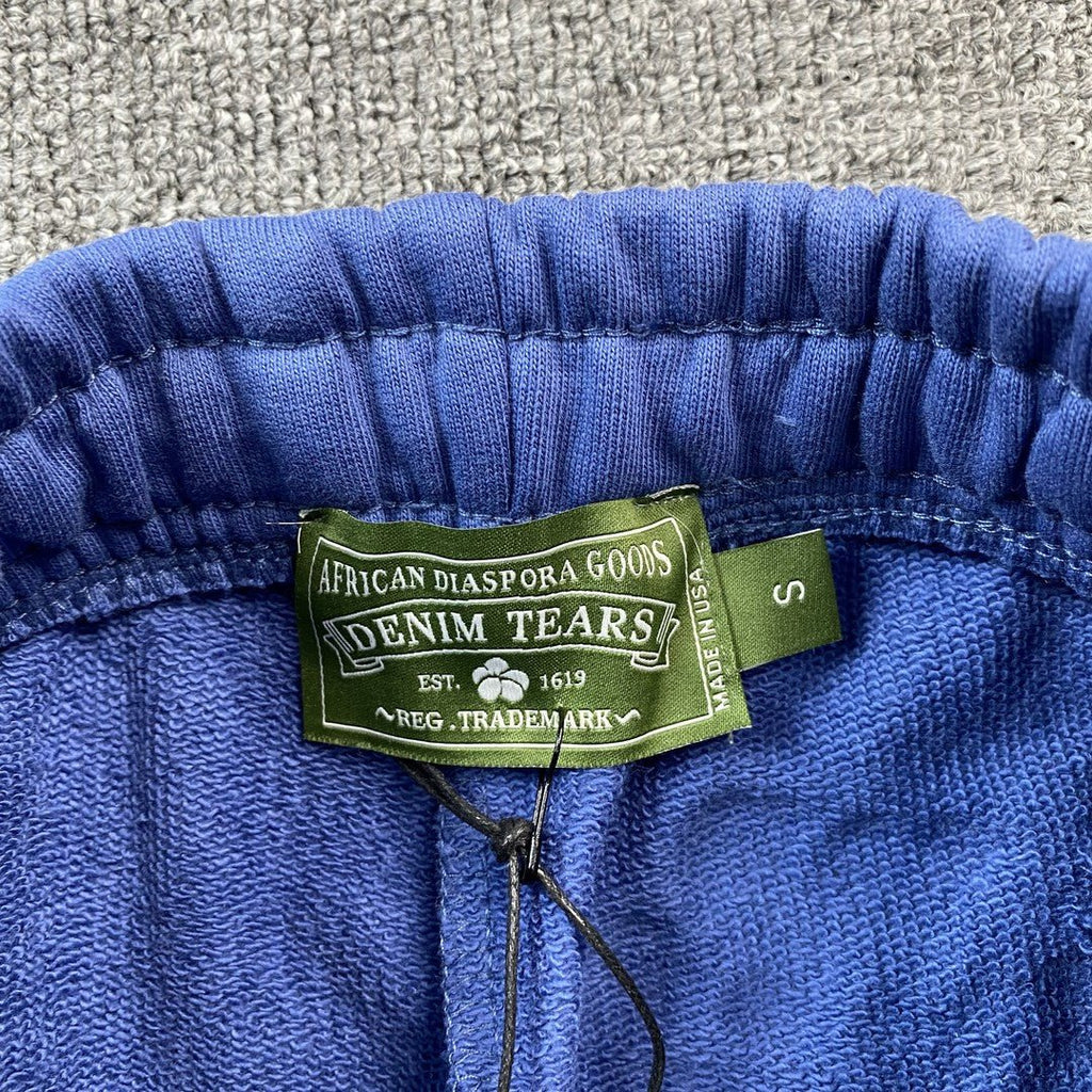 DENIM TEARS COTTON WREATH SWEATPANTS BLUE - netstar