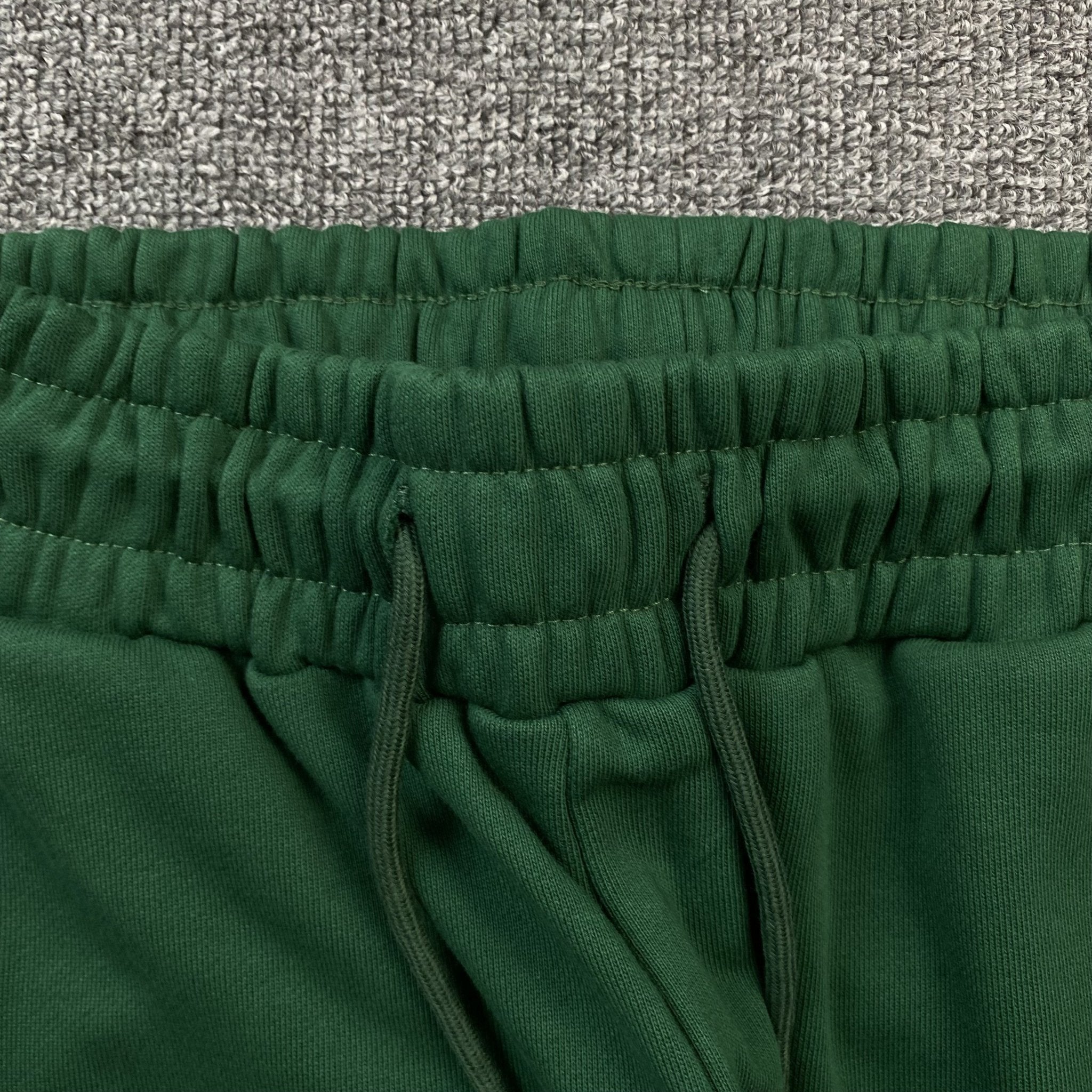 DENIM TEARS COTTON WREATH SWEATPANTS DARK GREEN - netstar