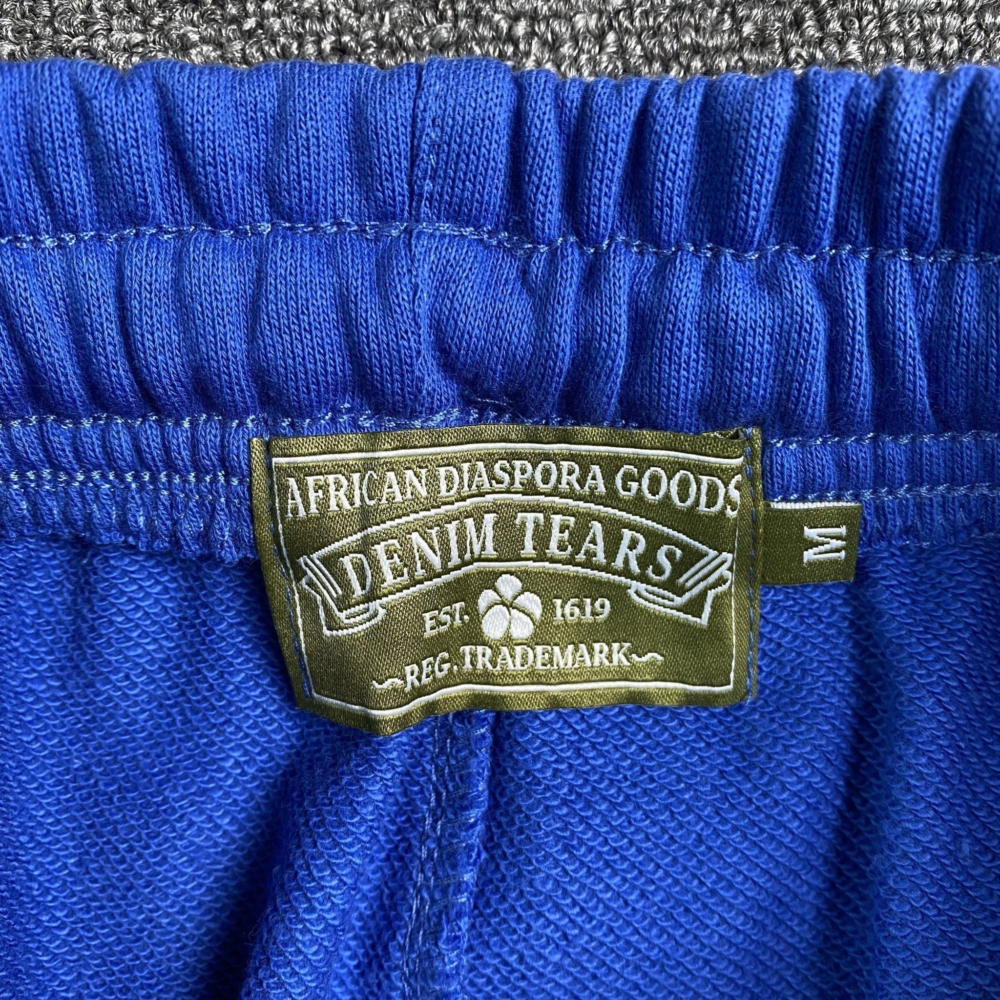 DENIM TEARS COTTON WREATH SWEATPANTS DEEP BLUE - netstar