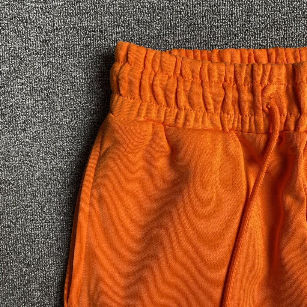 DENIM TEARS COTTON WREATH SWEATPANTS ORANGE - netstar
