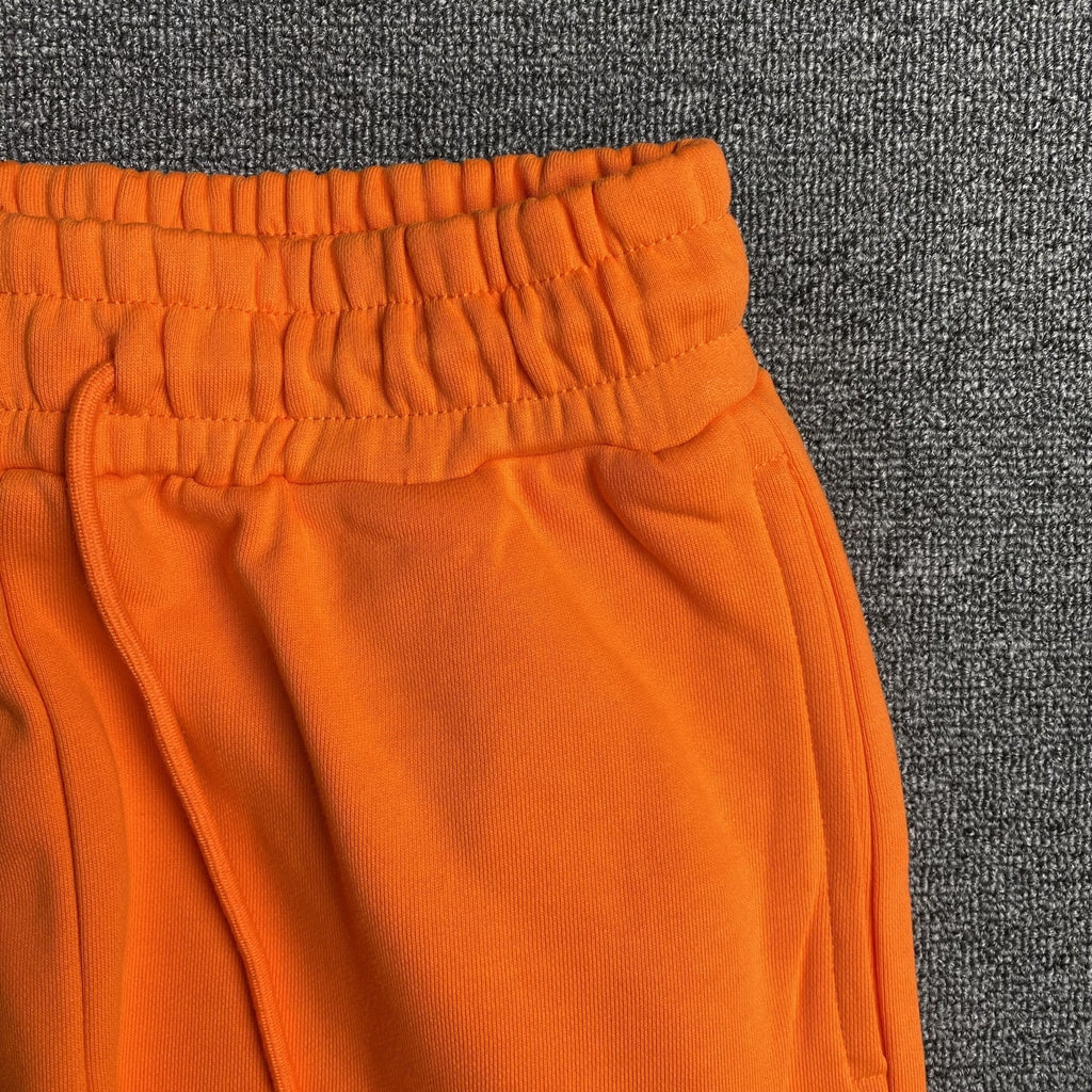 DENIM TEARS COTTON WREATH SWEATPANTS ORANGE - netstar